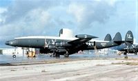 145933 @ NAS - On flight line at NAS Agana Guam - by unknown