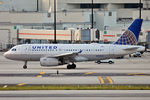 N822UA @ KMIA - Taxiing out for departure - by Robert Kearney