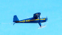 CF-FZD - Interesting and historic tail-dragger seen in flight above ice covered Midland Bay, part of Georgian Bay - by Robert Codd