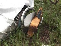N121GD - wooden prop after flying into power lines - by M.Compton