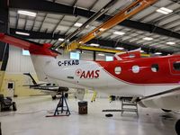 C-FKAB @ CYSB - just arrived (along with another PC-12 from ZA same source) in hangar at CYSB - undergoing maintenance and conversion to new owner - by Russell MacDonald