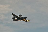 C-FDKC - Flying over the Ottawa River during a golden sunset - by Greg Scriver