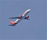 OE-IZB - OE-IZB over Minehead. - by andrew1953