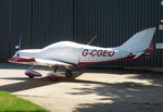 G-CGEO @ EG02 - Parked and covered outside the hangar at Audley End, Essex - by Chris Holtby