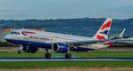 G-TTNL @ EGAC - A British Airways A320-251 touches down on runway 22 at Belfast City Airport - by Jim O'Neill