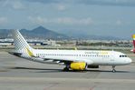 EC-MBS @ LEBL - Vueling A320 taxiing for departure - by FerryPNL