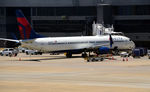 N855DN @ KATL - Gate T3 Atlanta   Stick hold up airplane, so it don't fall down - by Ronald Barker
