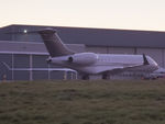 EJ-FLCB @ EGJB - Parked late evening outside the Aigle hangar at Guernsey, after a registration change - by alanh