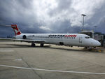 VH-YQV @ SYD - Threatening skies over Mascot - by Micha Lueck