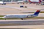 N975EV @ KATL - N975EV   Bombardier CRJ-200ER [7599] (Delta Connection) Atlanta-Hartsfield~N 11/04/2010 - by Ray Barber