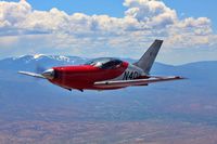 N4QV @ KLAM - Questair Venture in flight over northern New Mexico. - by Will Fox
