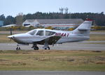 N114AT @ EGLK - Rockwell Commander 114B at Blackbushe. - by moxy