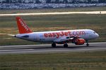 G-EZWA @ LFBO - Airbus A320-214, Reverse thrust landing rwy 14R, Toulouse-Blagnac Airport (LFBO-TLS) - by Yves-Q