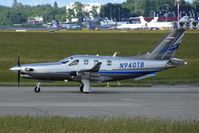 N940TB @ LSGG - Taxying to the active runway at Geneva Airport - by Thierry Crocoll
