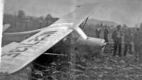 N2713E @ S43 - Aeronca 7AC Champ in the mud without the landing gear, possible ground loop.  Harvey Field photo - by Mark Peterson