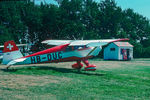 HB-DUC @ EKAE - Parked on a fine airfield. Look at the tower! Scanned from a slide. - by sparrow9