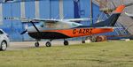 G-AZRZ @ EGHH - Parked at the paintshop - by John Coates