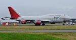 VQ-BZV @ EGHH - Being towed to  apron on arrival - by John Coates