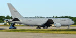 17-46038 @ KPSM - CLEAN21 sits on the ramp after dragging MN F-16s across the pond. - by Topgunphotography