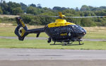G-HEOI @ EGFH - Visiting NPAS helicopter departing after taking on fuel. - by Roger Winser