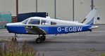 G-EGBW @ EGHH - On its way to the paintshop - by John Coates