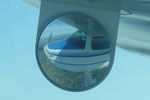 N6444T - 1985 Cessna R182, c/n: R18202026, Objects in mirror are closer than they appear. - by Timothy Aanerud