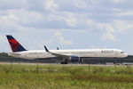 N587NW @ KRSW - Delta Flight 2361 departs Runway 24 at Southwest Florida International Airport enroute to Minneapolis/St Paul International Airport - by Donten Photography