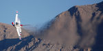 92-3890 @ KLSV - lead solo performing a tight 360 in front of sunrise mountain. - by Topgunphotography