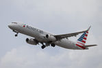 N989AU @ KRSW - American Flight 487 departs Runway 6 at Southwest Florida International enroute to Philadelphia International Airport