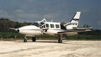 N116PM @ MYXI - N116PM on the ground at Scotland Cay Bahamas circa 1994 - by Bill Meyers