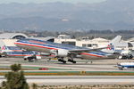N768AA @ KLAX - American B772, N768AA departing 25R LAX - by Mark Kalfas