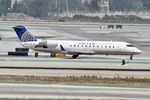 N471CA @ KLAX - SkyWest/United Express CRJ-200ER, N471CA at LAX - by Mark Kalfas