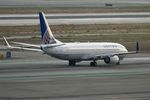 N27205 @ KLAX - United Boeing 737-824, N27205 departing 25R LAX - by Mark Kalfas