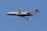 N920SW @ KLAX - SkyWest/United Express, Bombardier CRJ-200LR N920SW, departing 25RLAX - by Mark Kalfas
