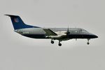 N271YV - SkyWest/United Express Embraer EMB-120ER, N271YV on a stormy approach to runway 7R LAX - by Mark Kalfas