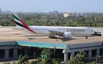 A6-EWI @ KFLL - Emirates 777-200 zx - by Florida Metal