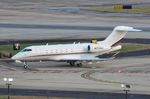 N773QS @ KATL - Netjets CL350 taxying to the FBO - by FerryPNL