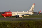 SE-RRJ @ EKCH - Norwegian B738 vacating the runway - by FerryPNL