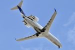 N701BR @ KORD - SkyWest/United Express CRJ2 N701BR SKW5055 DEC-ORD, 10C approach KORD - by Mark Kalfas