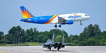 N219NV @ KPSM - SIEGE11 holds short as Allegiant comes in from FL - by Topgunphotography