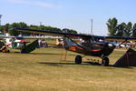 C-FXDQ @ KOSH - This black Cessna 172 was at EAA Air Venture 2023 - by lk1250