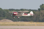 N195JP @ OSH - 1951 Cessna 195, c/n: 7673, AirVenture 2023 - by Timothy Aanerud