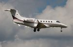 N423QS @ KORL - Phenom 300 zx - by Florida Metal