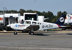 G-FLXY @ EGLK - Piper PA-28-181 Cherokee Archer III at Blackbushe. - by moxy