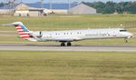 N570NN @ KCVG - PSA/AE CRJ9 zx CVG-CLT - by Florida Metal