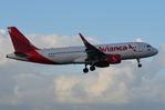 N742AV @ KMIA - Avianca A320 arriving at dusk - by FerryPNL