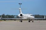 N424PX @ KAPF - Plains Exploration G4 on the tarmac in Naples - by FerryPNL