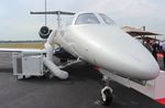 N588EE @ KORL - Phenom 300 zx - by Florida Metal