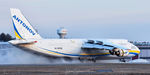 UR-82008 @ KPSM - Kicking up all the salt on the runway - by Topgunphotography