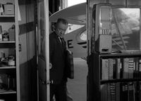 N4722E @ UNK - This Aeronca Champ was used as a background prop for an episode of Perry Mason in 1965. It was in several shots taken at an unknow airport in the Segment of The Case of the Vanishing Victim, Season 9, Episode 17. - by Still frame from TV show